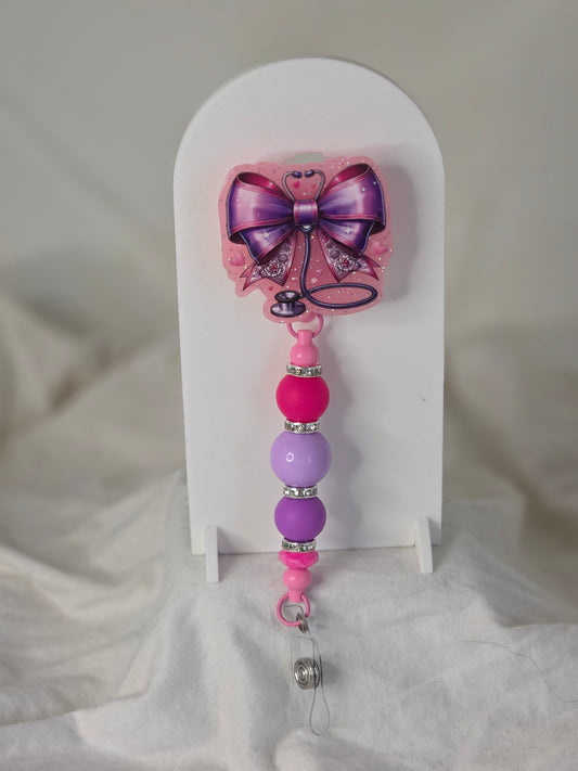 Stethoscope and Bows Badge Reel